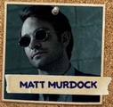 A picture of Matt Murdock pinned to a board