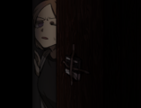 Girl checking for something behind furniture