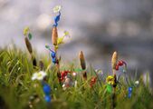 Pikmin climbing on some horsetails.