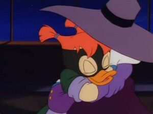 Darkwing and his daughter hugging.jpg