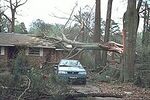 This house only sustained minor loss of shingles. Though well-built structures are typically unscathed by F0 tornadoes, falling trees and tree branches can injure and kill people, even inside a sturdy structure.